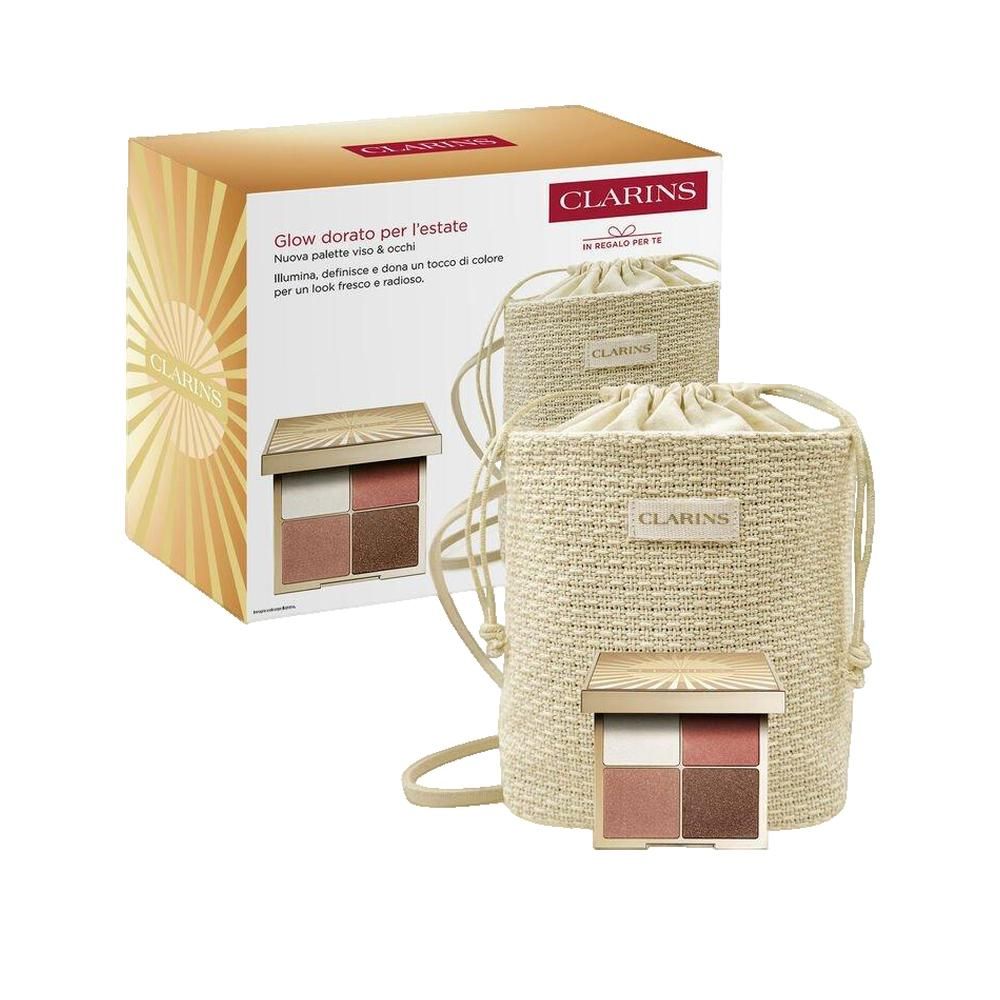 Palette trucco quattro colori, pochette e confezione. Marchio Clarins. Testo: Glow dorato per l'estate.