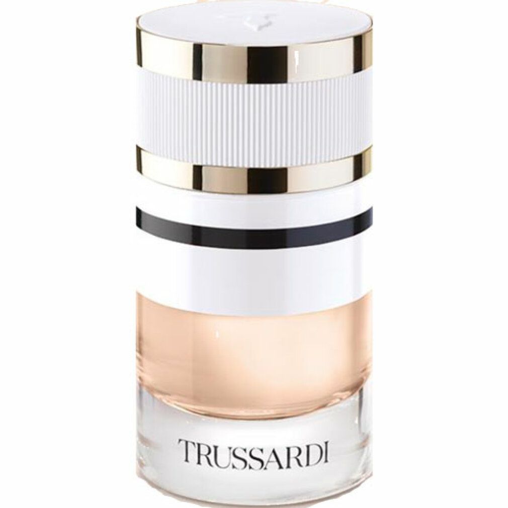 Flacone cilindrico bianco, oro e nero. Scritta "TRUSSARDI" in basso.