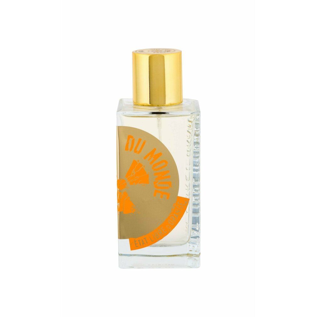 Flacone di profumo con tappo dorato. Scritta: Du Monde, Etat Libre d'Orange. Etichetta con design arancione.