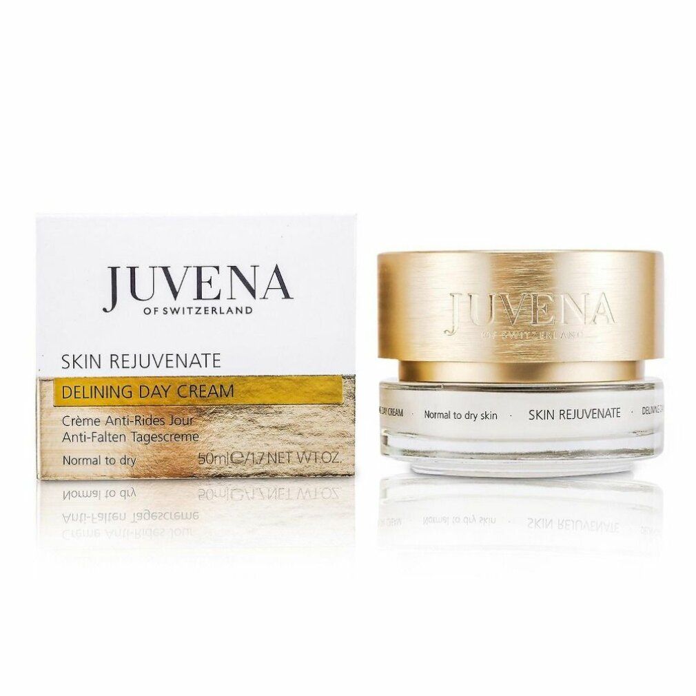 Confezione e vasetto di crema. Sulla confezione è scritto "JUVENA OF SWITZERLAND". Il vasetto ha un coperchio dorato. Scritta: "SKIN REJUVENATE".