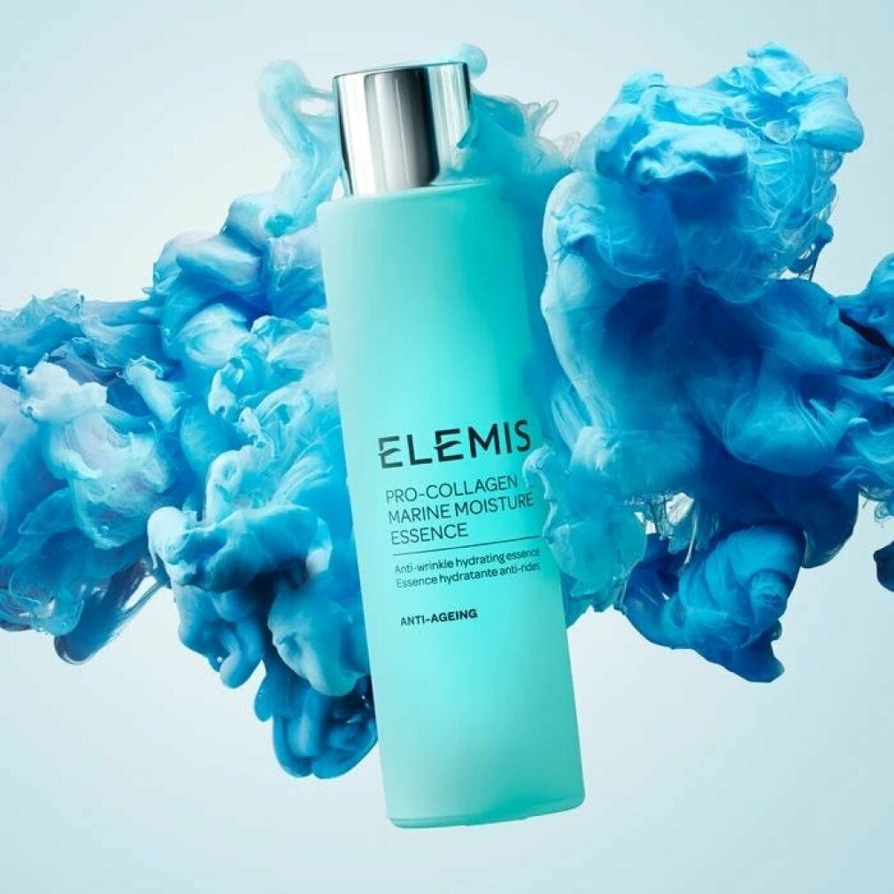 Flacone turchese con tappo argentato, circondato da fumo blu. Scritta: Elemis Pro-Collagen Marine Moisture Essence.