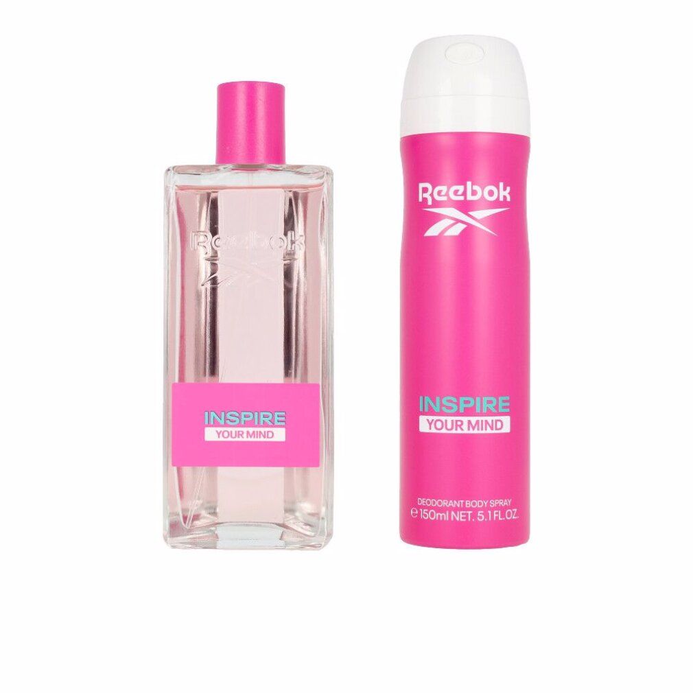 Due prodotti: flacone e spray. Entrambi rosa con logo Reebok bianco. Scritta: INSPIRE YOUR MIND.