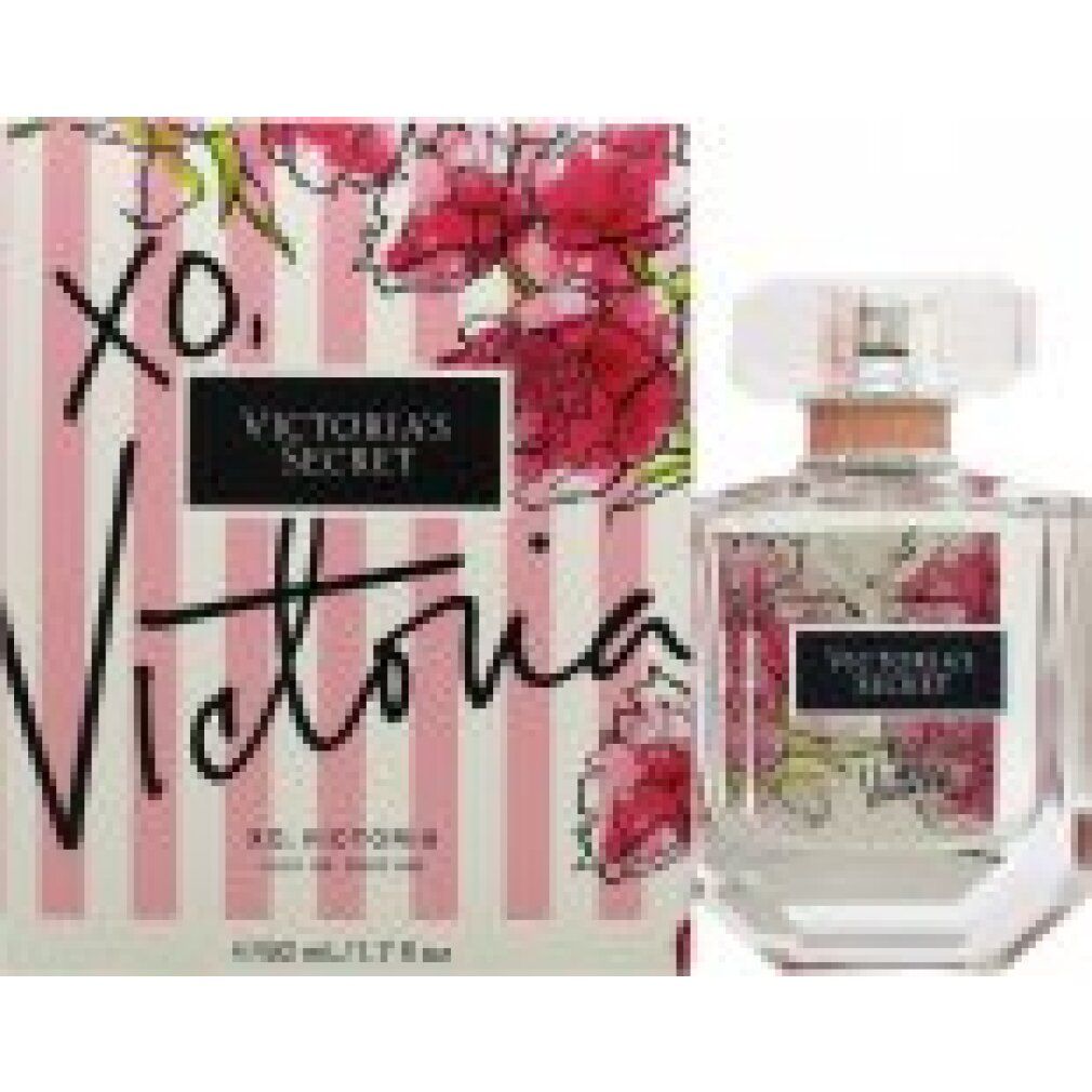 Flacone di profumo e confezione. Flacone con etichetta. Confezione con motivo floreale e testo.