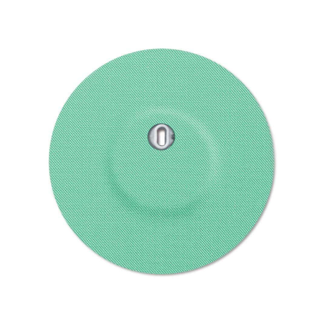Cerotto rotondo menta con foro di ventilazione. Parte metallica centrale.
