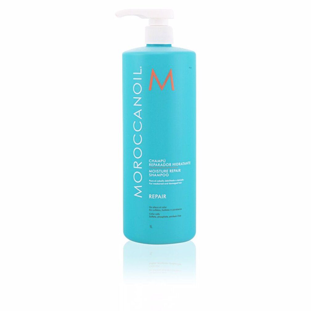 Flacone di shampoo turchese con dosatore bianco. Scritta: Moroccanoil, Moisture Repair Shampoo, Repair. Logo arancione.