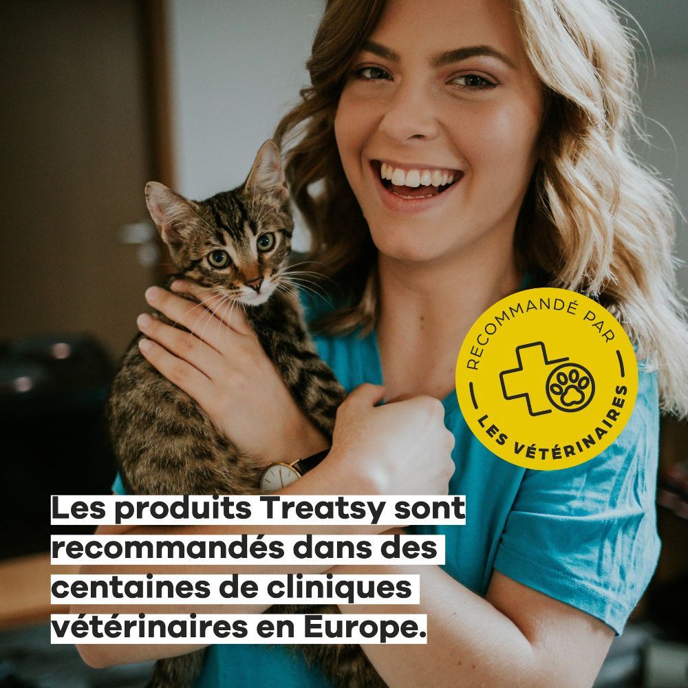Donna con gatto. Testo: "I prodotti Treatsy sono raccomandati in centinaia di cliniche veterinarie in Europa."