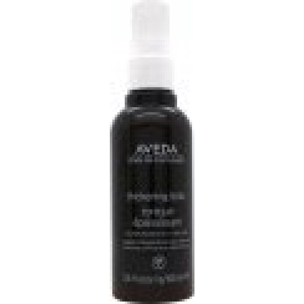 Flacone scuro con vaporizzatore bianco. Scritta: Aveda, Protecting Nurturing, leave-in, Aveda serum. Logo vegano.