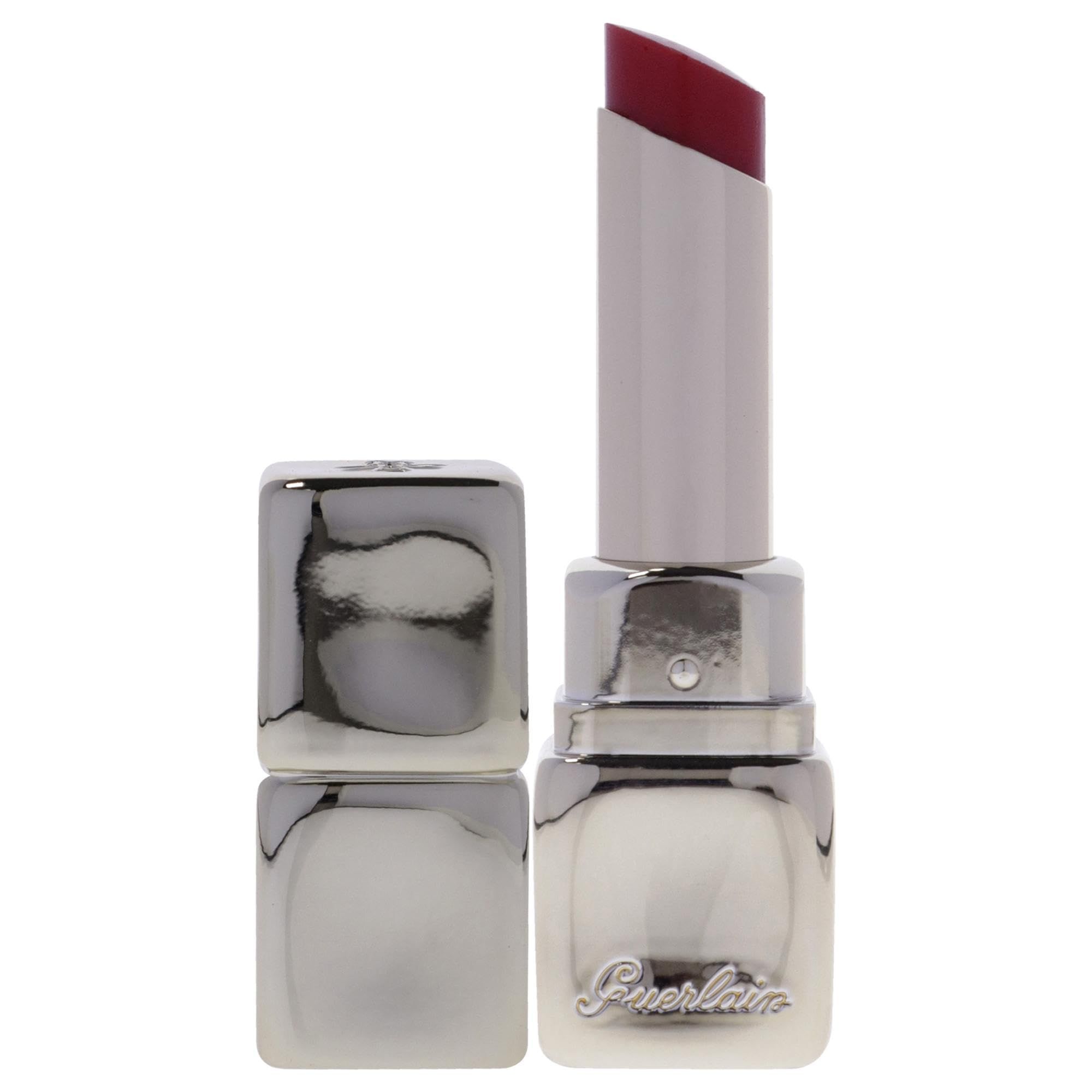 Balsamo labbra con astuccio argentato e mina rossa. Tappo accanto. Marchio Guerlain.