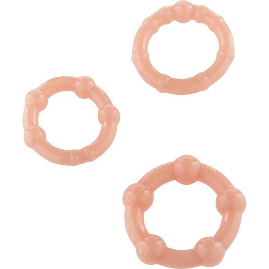 Tre anelli per pene in gelatina rosa di varie dimensioni con bottoni.