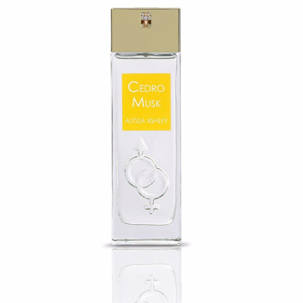 Flacone rettangolare con tappo dorato. Etichetta gialla con "Cedro Musk" e "Alyssa Ashley".