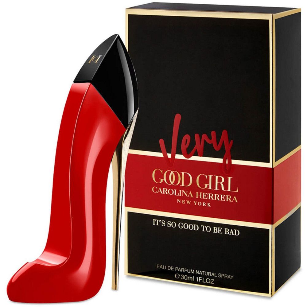 Flacone rosso a forma di scarpa con tacco nero. Scatola nera con testo rosso. Testo: Very Good Girl. Carolina Herrera.