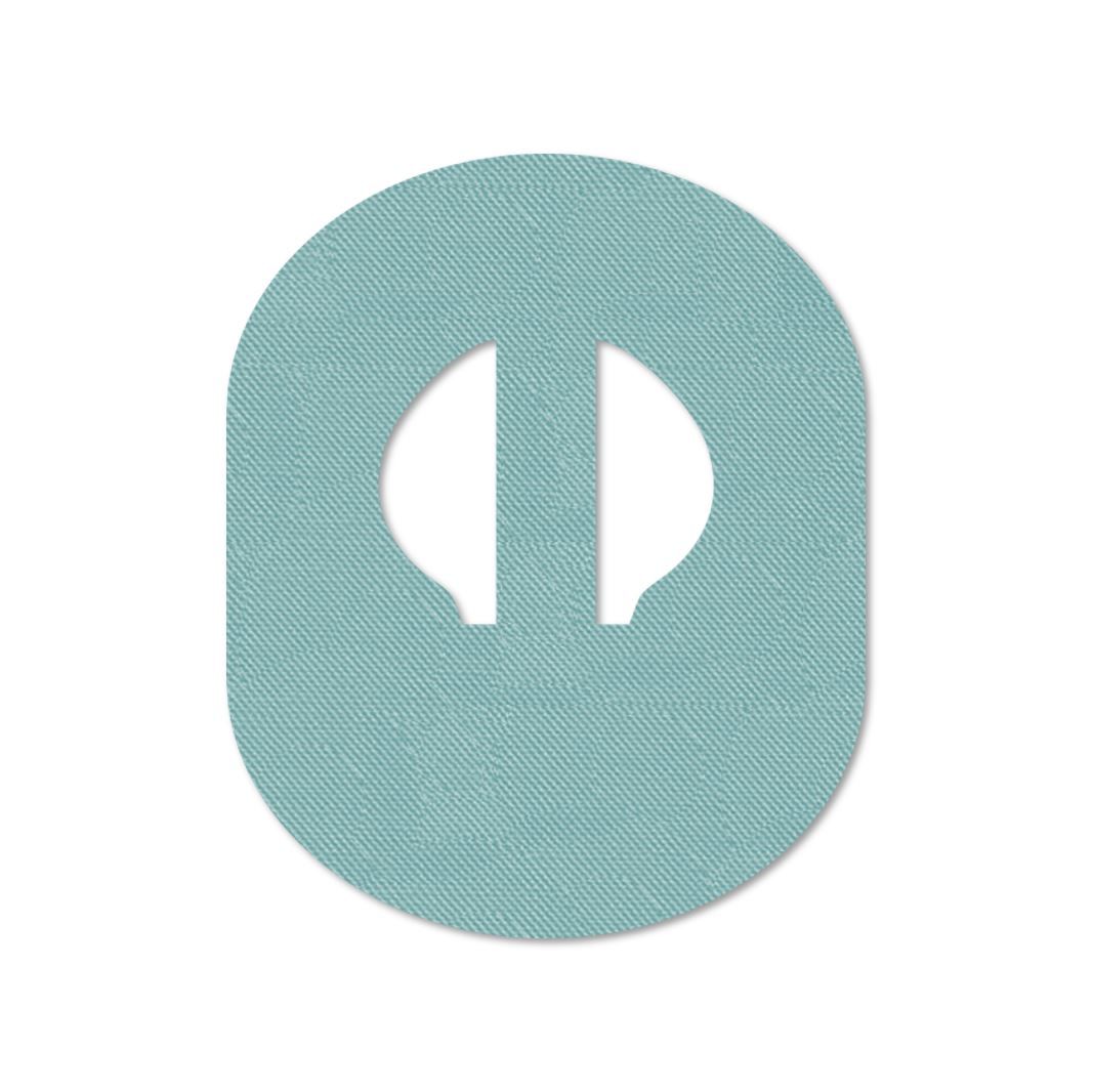 Cerotto di fissaggio azzurro, ovale con intaglio. Superficie tessile, senza altri dettagli.