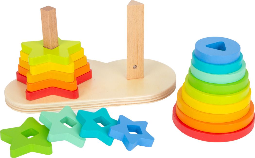 Gioco ad incastro in legno con forme a stella e cerchio arcobaleno. Su base in legno con pioli in legno. Stelle accanto.