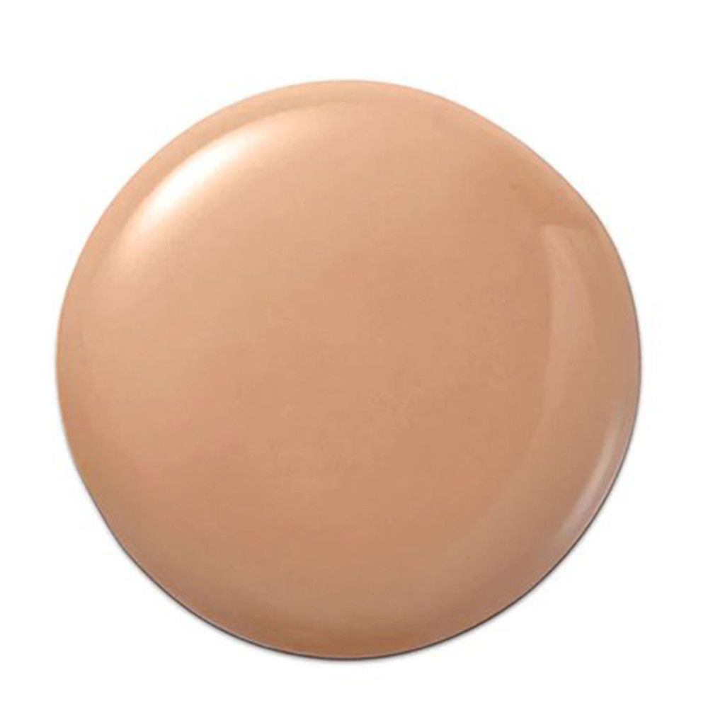 Goccia di trucco beige. Forma rotonda. Superficie lucida. Su sfondo bianco.