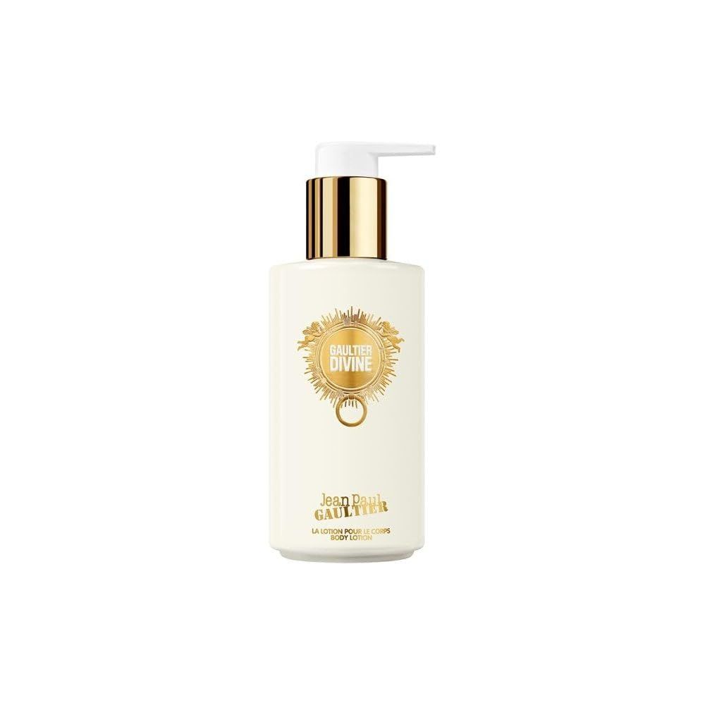 Flacone di crema bianco con dettagli dorati. Scritta: Gaultier Divine, Jean Paul Gaultier. Con dosatore.