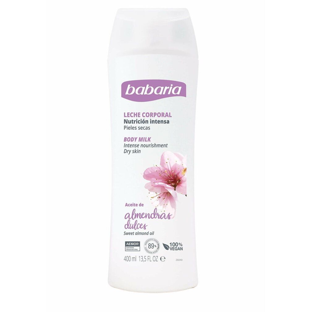 Flacone bianco Babaria Body Milk. Scritta: Leche Corporal, Nutrición intensa, Pieles secas, Body Milk, Intense nourishment, Dry skin. Fiore di mandorlo.