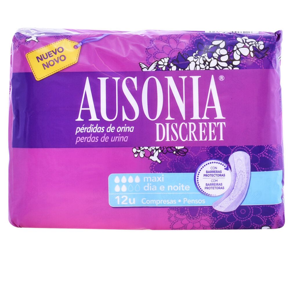 Confezione di Ausonia Discreet. Confezione viola con immagine del prodotto. Testo: Nuevo, Maxi, Dia e noite, 12 pezzi.