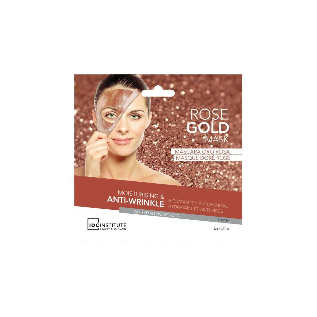 Maschera viso Rose Gold, anti-rughe. Donna con maschera su metà viso. Confezione con nome prodotto e marchio.