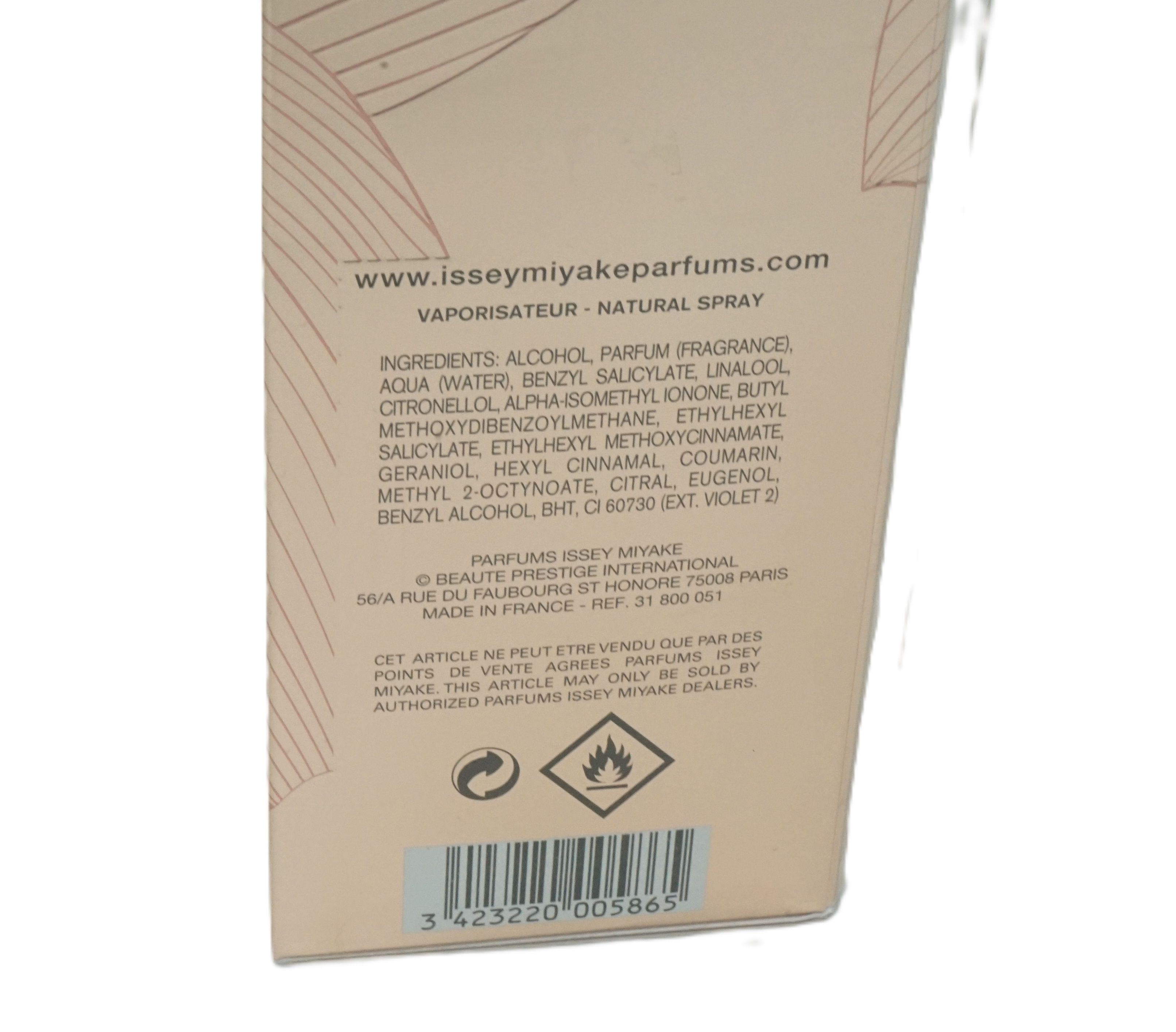Confezione profumo. Testo: Issey Miyake, Nectar D'Issey, Première Fleur. Design dorato con motivo floreale. 90ml, 3 fl.oz.