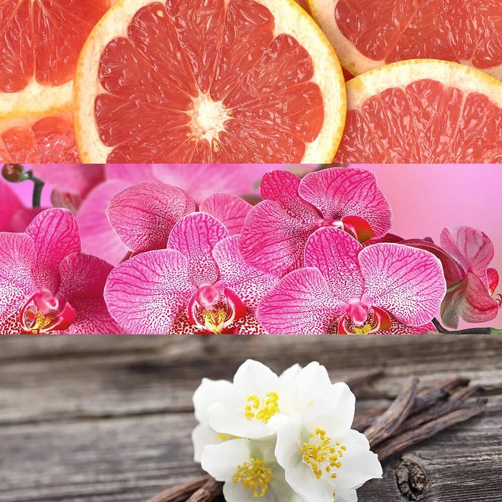 Primo piano di pompelmo, orchidee e fiori di gelsomino. Su fondo di legno.