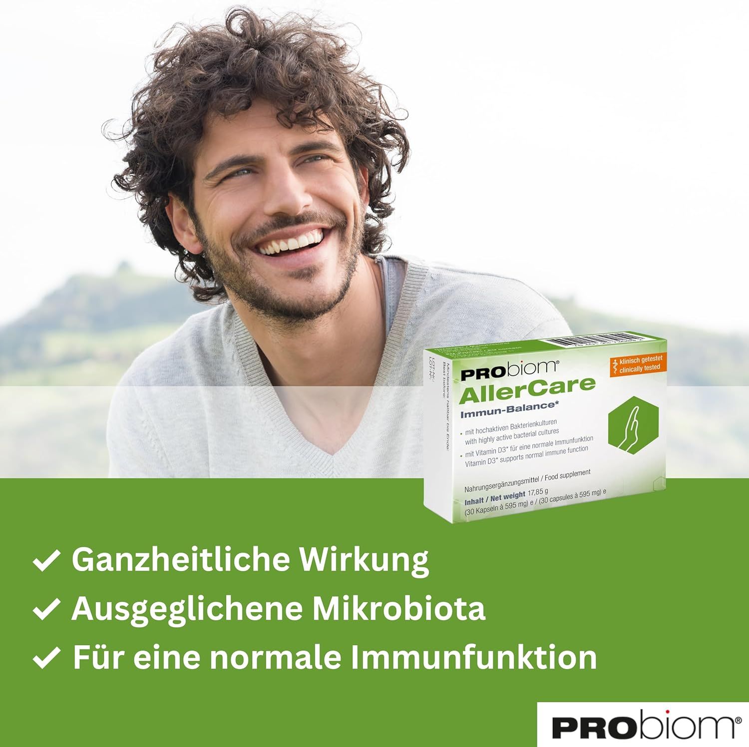 Uomo sorridente. Confezione Probiom AllerCare. Testo: Effetto olistico, Microbiota bilanciato, Per una normale funzione immunitaria.