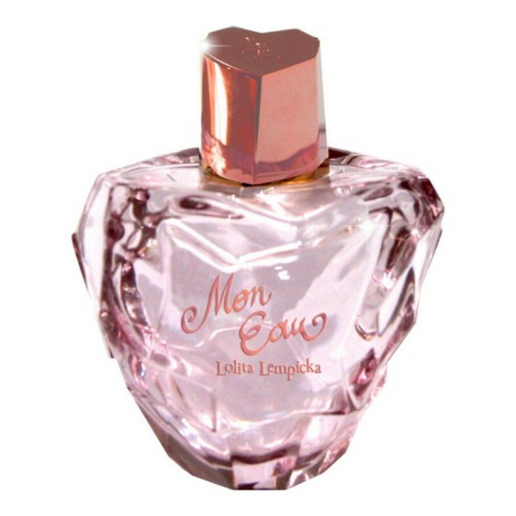 Flacone di profumo rosa a forma di cuore, con tappo rosa. Scritta "Mon Eau" e "Lolita Lempicka".