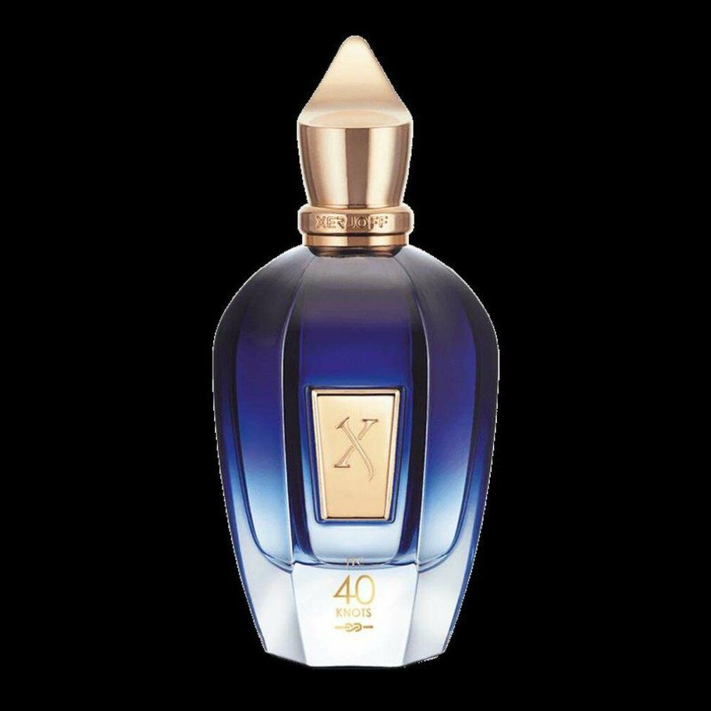 Flacone blu trasparente con tappo dorato. Etichetta dorata con 'X' e '40 Knots'.