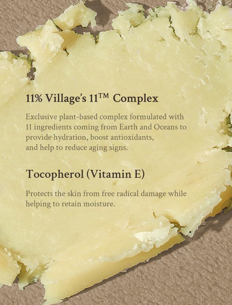 Texture crema solare gialla. Testo: 11% Complesso Village's 11™. Tocoferolo (Vitamina E). Protegge dai danni.