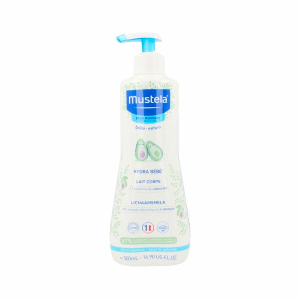 Flacone bianco con dosatore blu. Scritta: Mustela, Hydra Bébé Lait Corps. Illustrazione di avocado. Testo multilingue.