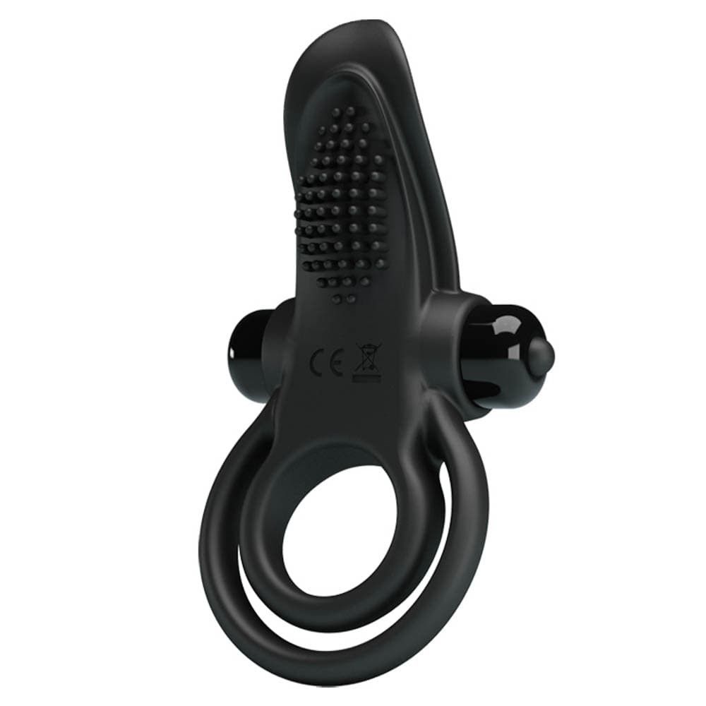 Anello penieno nero con due anelli e stimolatore. Marchio CE visibile.