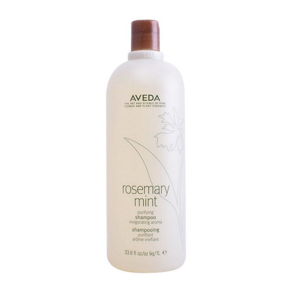 Flacone di shampoo Aveda. Design cilindrico bianco con tappo marrone. Scritta: Rosemary Mint, shampoo purificante. Logo e motivo floreale.