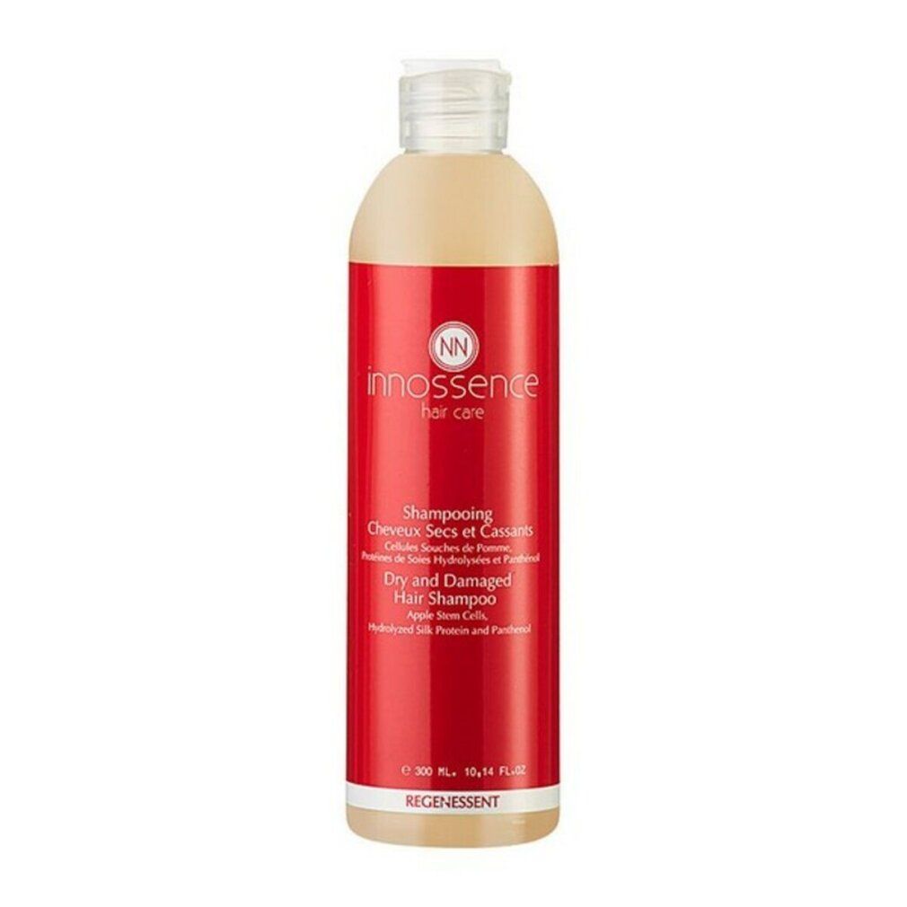 Flacone di shampoo con etichetta rossa. Scritta: Innossence, Shampooing Cheveux Secs et Cassants, Dry and Damaged Hair Shampoo.