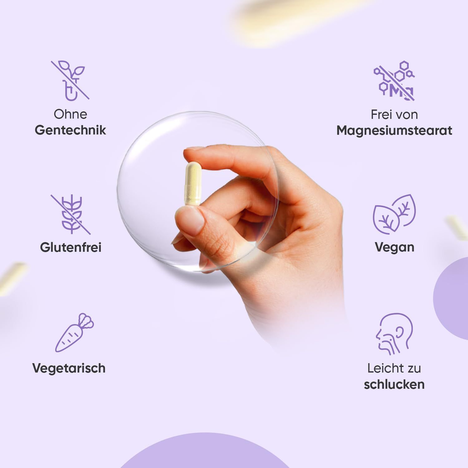 Mano che tiene una capsula gialla. Testo: Senza OGM, Senza glutine, Vegano, Vegetariano, Facile da deglutire, Senza stearato di magnesio.