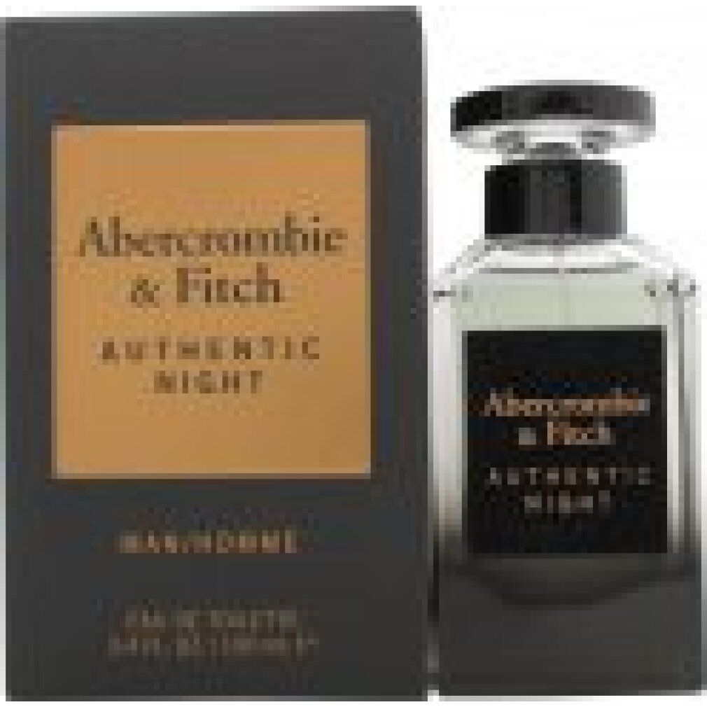 Flacone e scatola. Scatola nera con stampa dorata. Flacone con tappo ed etichetta neri. Testo: Abercrombie & Fitch AUTHENTIC NIGHT.