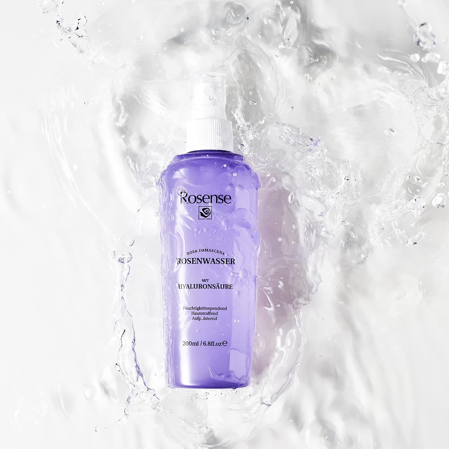 Spray Rosense viola in acqua. Testo: Acqua di rose con acido ialuronico.
