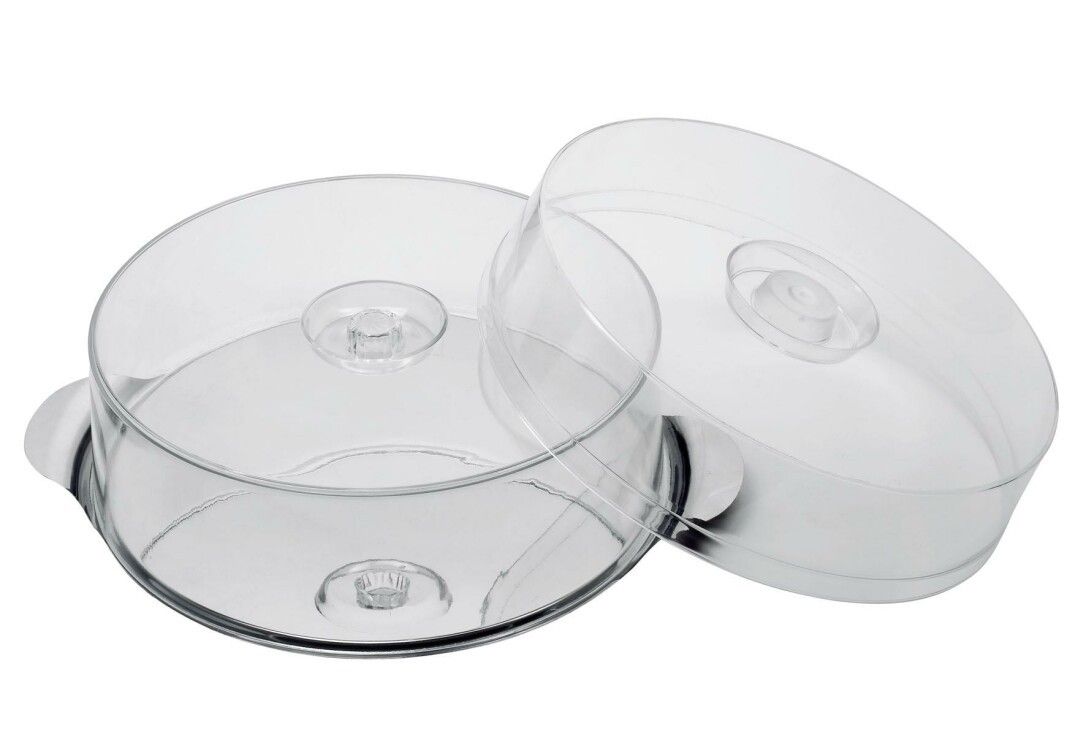Piatto rotondo per dolci con due cupole trasparenti. Manici in metallo. Plastica. Una cupola è aperta.