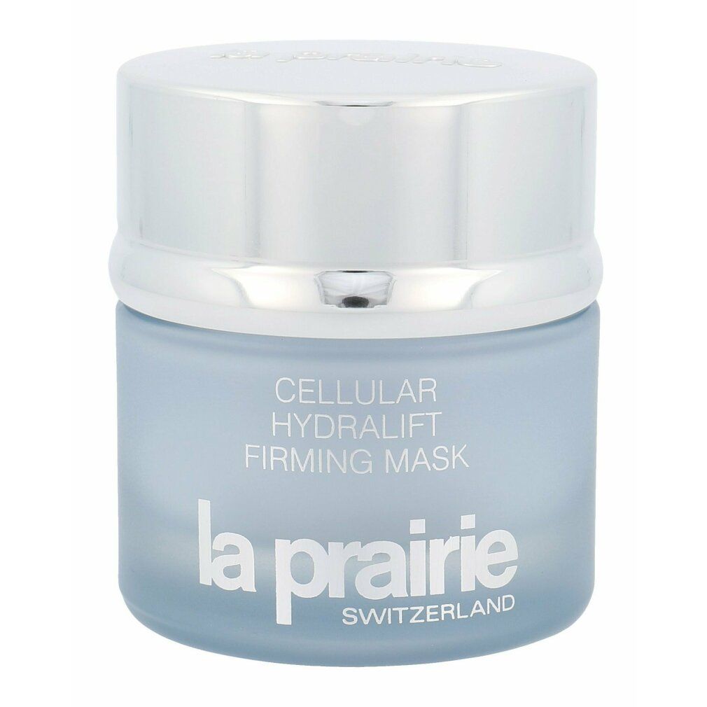 Vaso in vetro grigio con coperchio argentato. Scritta: Cellular Hydralift Firming Mask, La Prairie. Nome del prodotto e marchio.