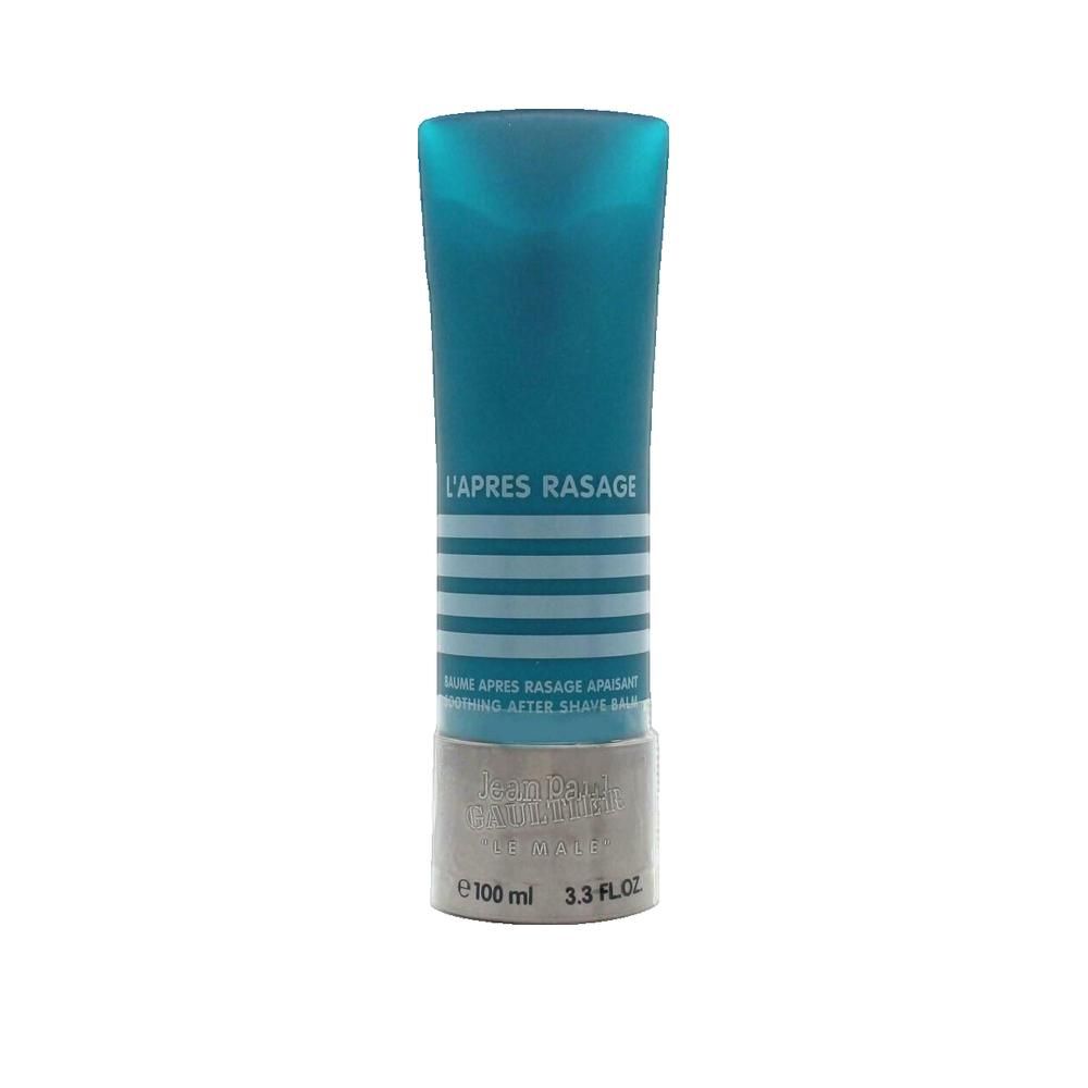 Tubo turchese con base argentata. Testo: L'APRES RASAGE, After Shave Balm, 100 ml, Jean Paul Gaultier.