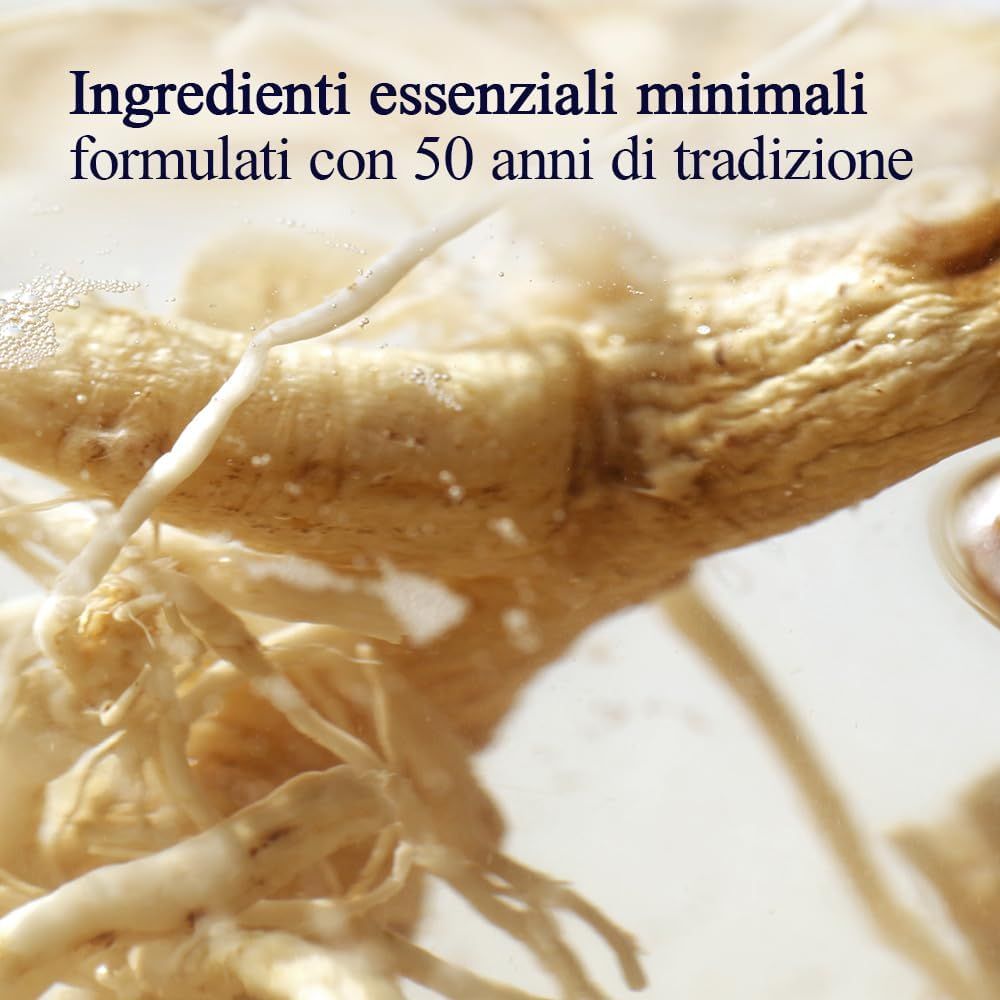 Primo piano di radici in un liquido. Testo: Ingredienti essenziali minimi formulati con 50 anni di tradizione.