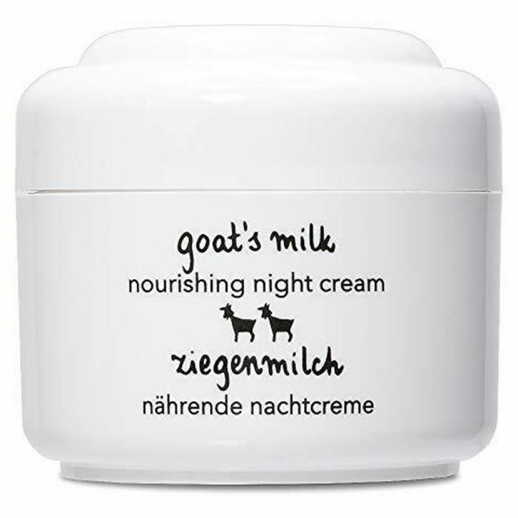 Vasetto bianco con scritta "goat's milk nourishing night cream" e Ziegenmilch. Illustrazioni di capre nere. Testo tedesco.