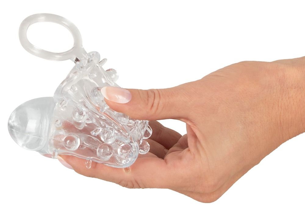 Anello per pene trasparente con borchie e un anello.