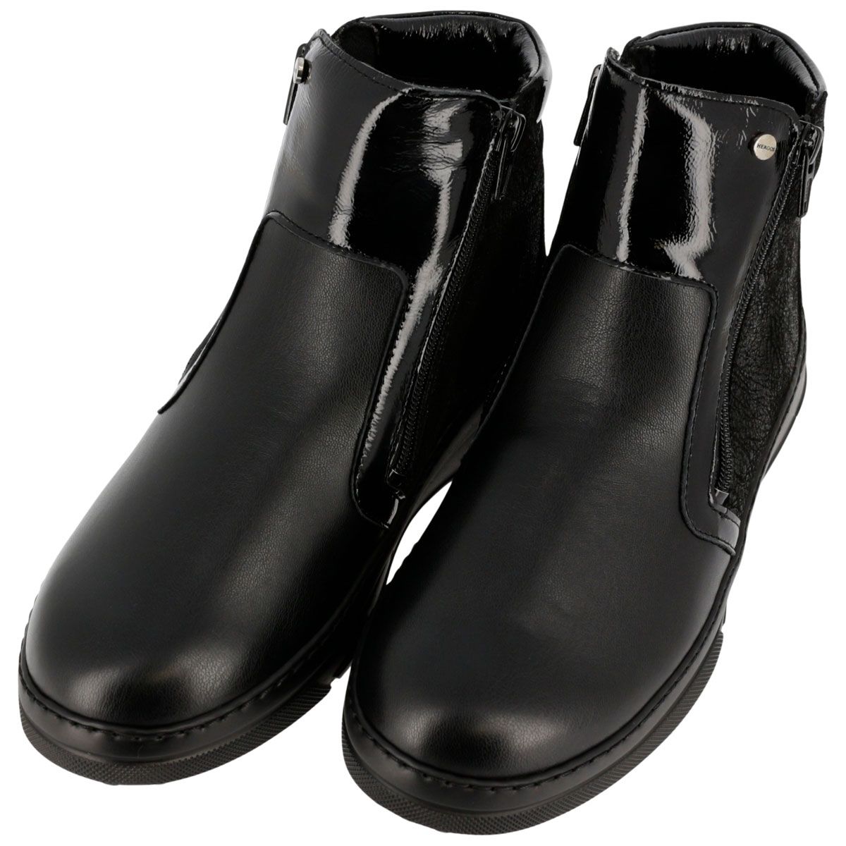 Stivali neri con zip e dettagli lucidi. Zip laterale, suola piatta. Forma di scarpa comoda.