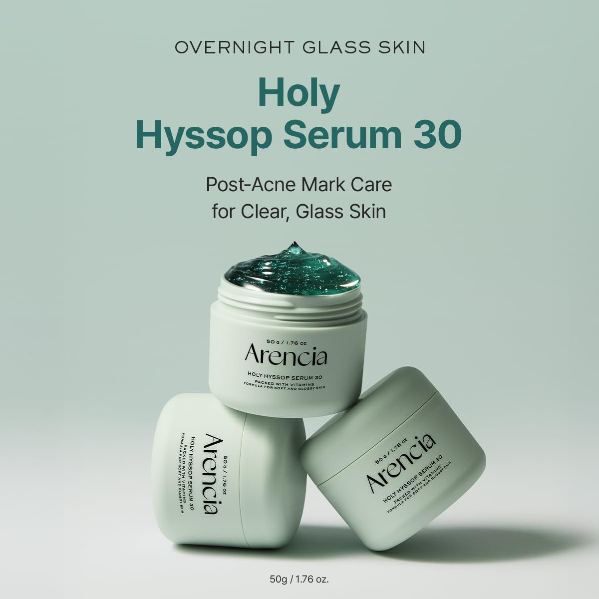 Tre vasetti di Holy Hyssop Serum 30, uno aperto con gel verde. Scritta: Arenchia. Testo: Overnight Glass Skin.
