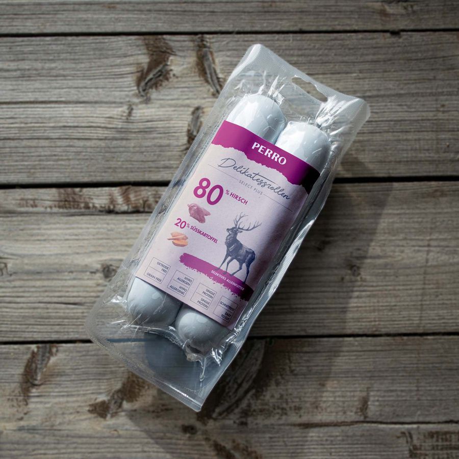 Confezione con due rotoli. Stampa: PERRO Delikatessrollen, cervo & patata dolce, 80% cervo.