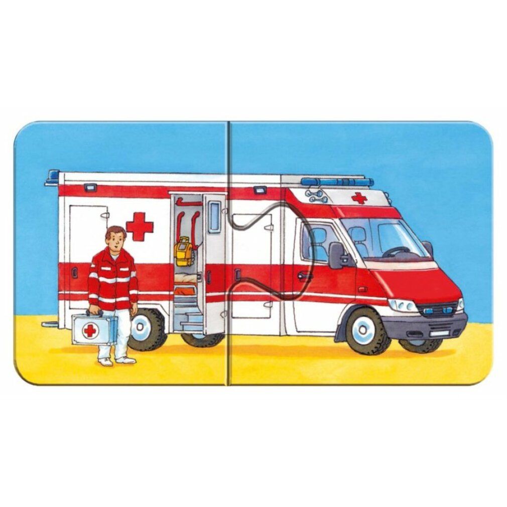 Puzzle in due pezzi con un'autopompa e un pompiere. Sfondo: erba verde.