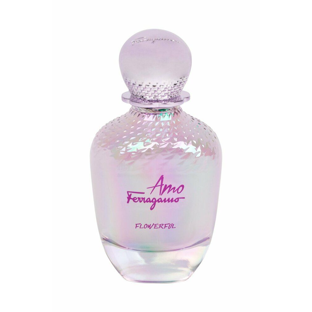 Flacone di profumo sfumato rosa. Scritta "Amo Ferragamo Flowerful". Tappo con motivo cristallo.