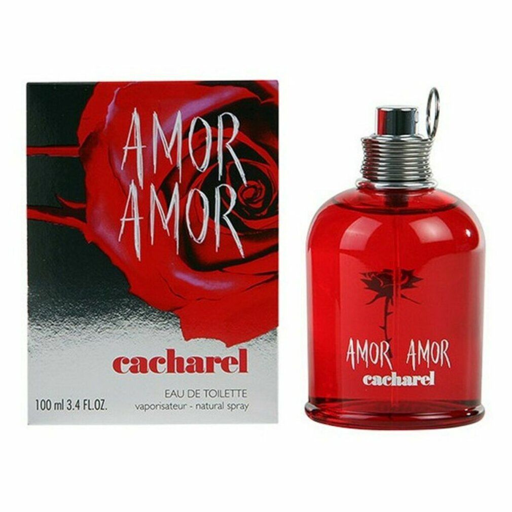 Flacone di profumo rosso e scatola. Sulla scatola: AMOR AMOR, Cacharel, rosa rossa. Flacone: AMOR AMOR, Cacharel.
