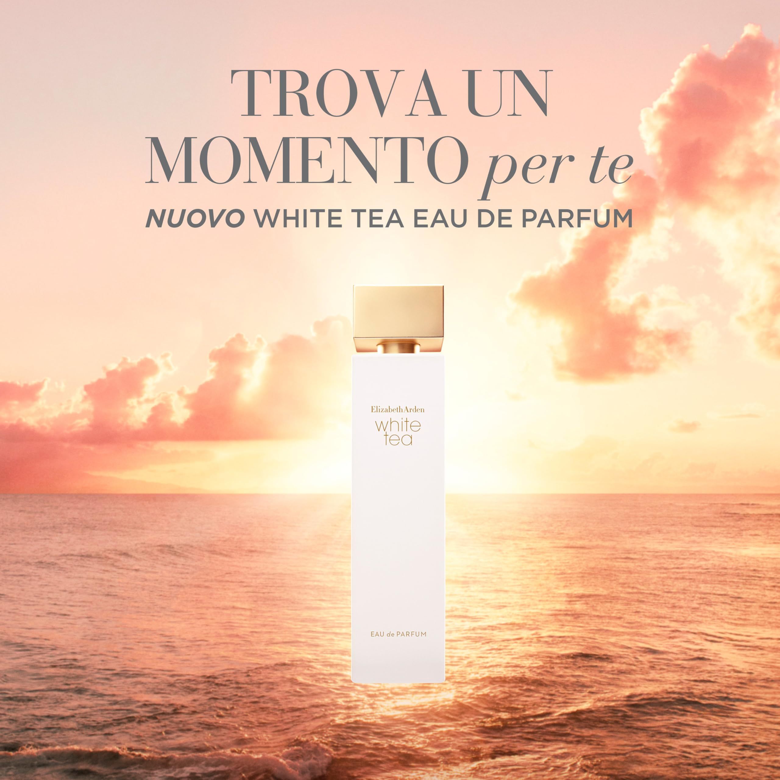 Flacone di profumo bianco con tappo dorato. Scritta: White Tea. Sfondo: tramonto sul mare.