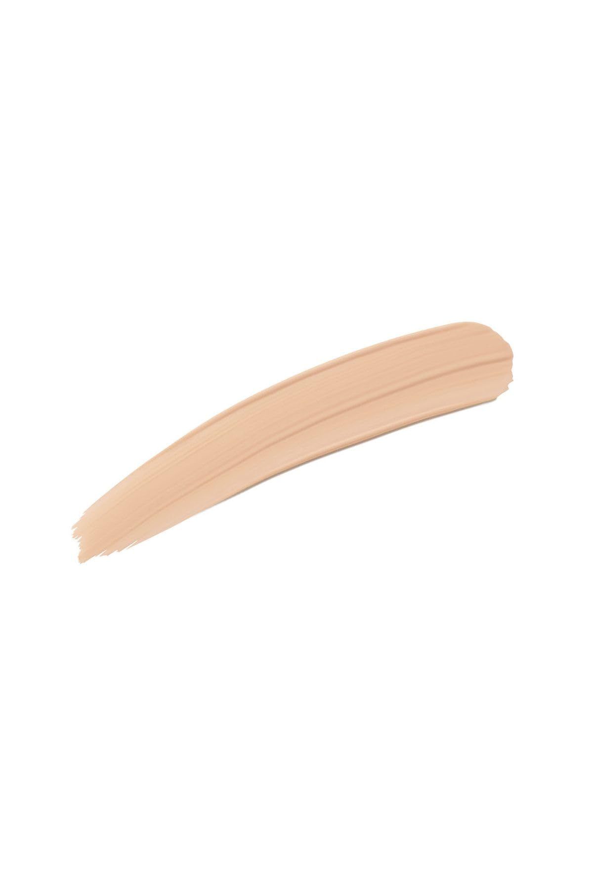 Tratto di colore crema chiaro su sfondo bianco. Texture visibile.