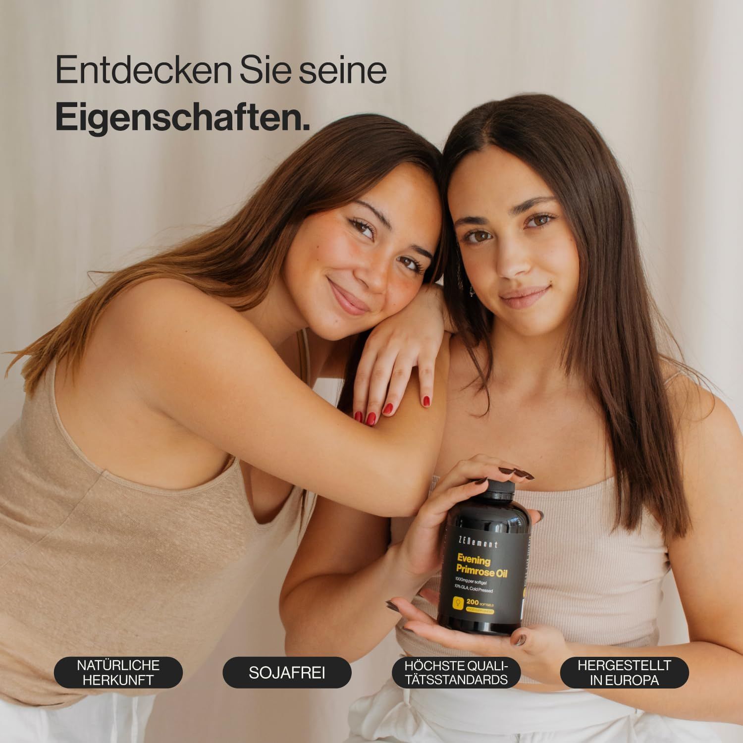 Due donne tengono in mano una bottiglia nera. La bottiglia riporta Zenement e Evening Primrose Oil. Scritte: Origine naturale, senza soia, standard di qualità.